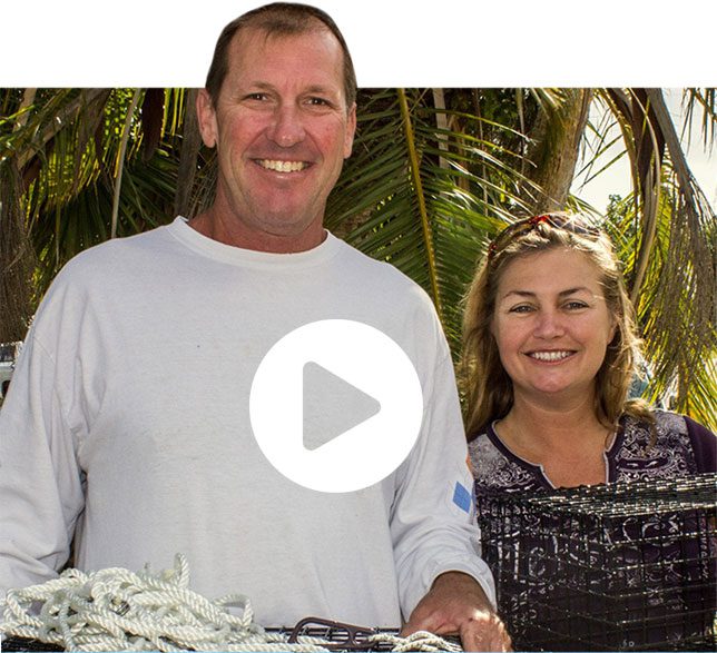 couple working with oyster restoration